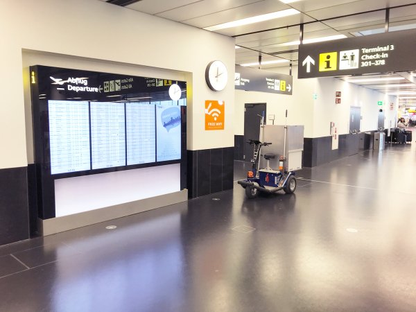 Zallys JACK electric tow tractor in an airport