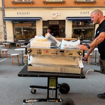 Heavy-duty Demtruk Folding Cart transporting bulky equipment with ease