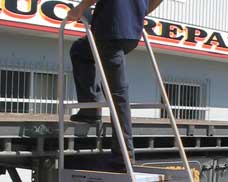 Step-Thru Mobile Access Platform showing dual safety rails