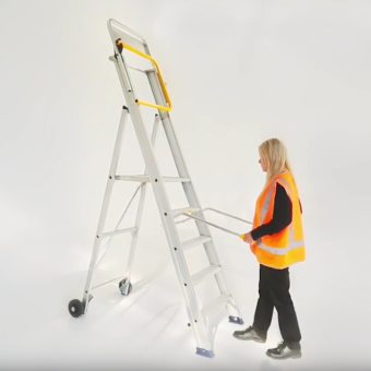 Omni Platform Ladder on jobsite showing all-terrain mobility