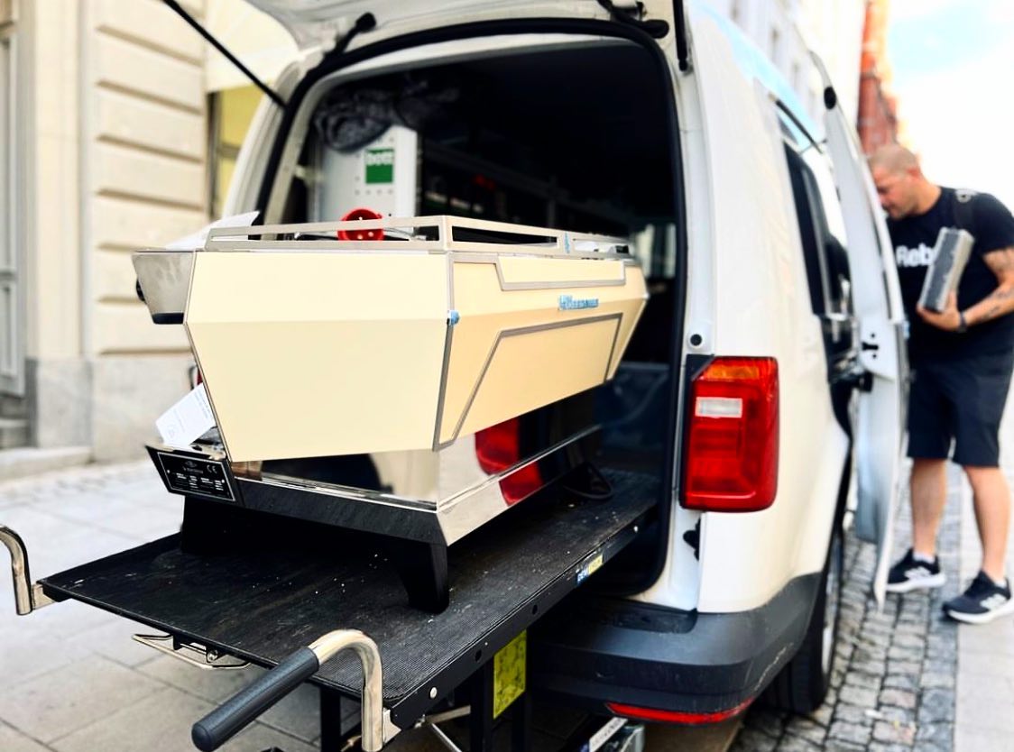 Demtruk Folding Cart DELUX 2.0 transporting a coffee machine