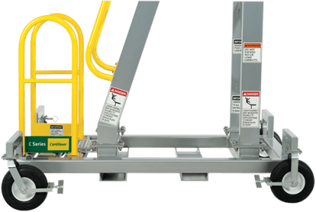 C Series Mobile Work Platform Ladder next to industrial equipment